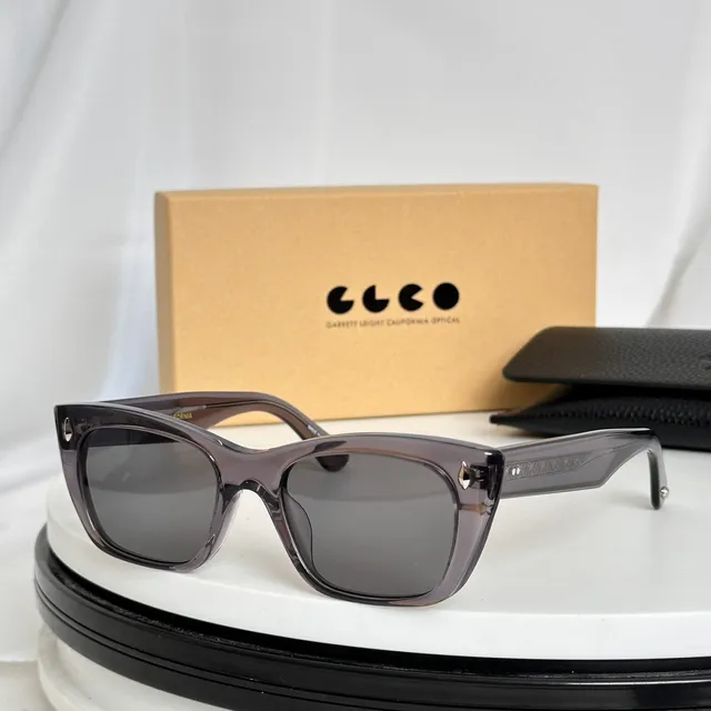 Garrett Leight Angular Cat-Eye Translucent Peach Sunglasses 9