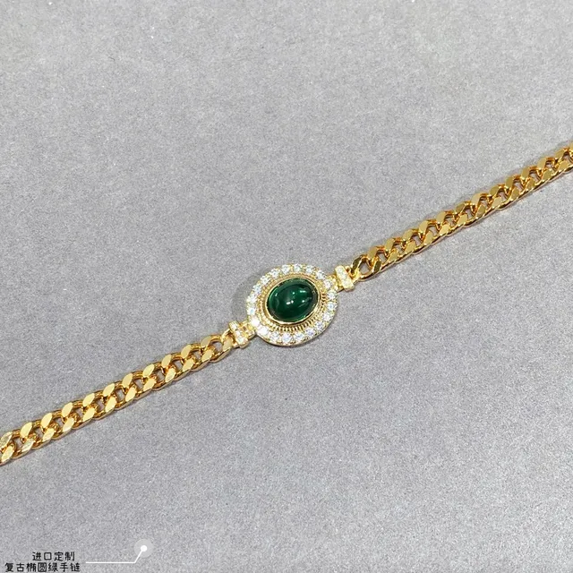 Bracelet en chaîne curb d'or cabochon ovale vert pavé 7