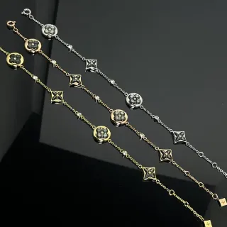 Pulsera de Cadena con Eslabones de Oro y Plata con Encanto Floral