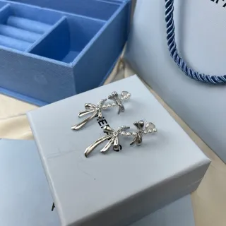 HEFANG Bow and Pearl Silver-Toned Earrings