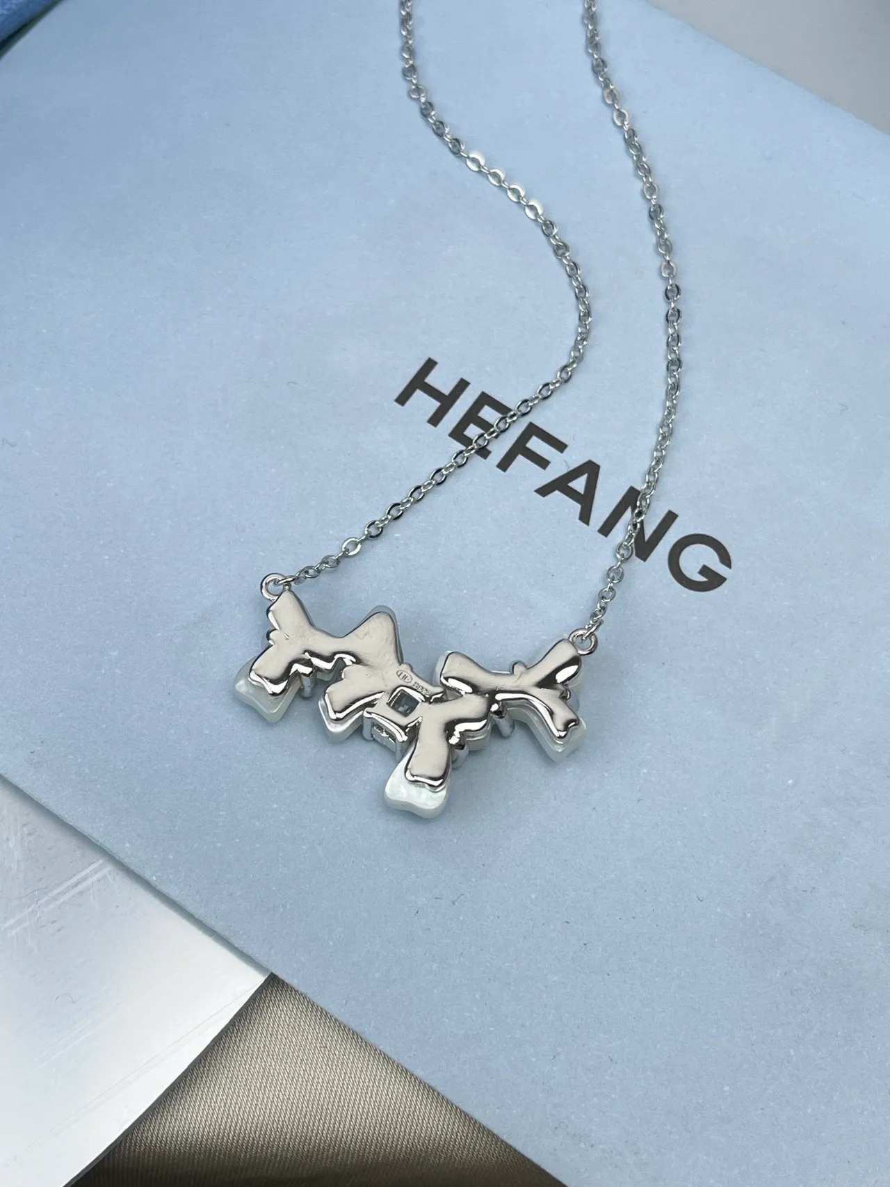 HEFANG Bow Motif Pearlized Ceramic Pendant Necklace 6