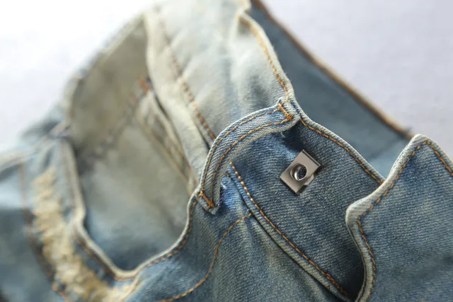 Light-Wash Distressed Moto-Panelled Zip-Pocket Jeans 16