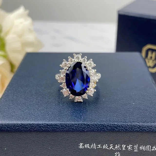 Oval Blue Gemstone Halo Ring 2