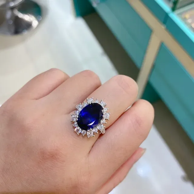 Oval Blue Gemstone Halo Ring 9