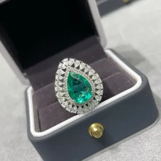 Pear-Cut Emerald and Diamond Halo Ring
