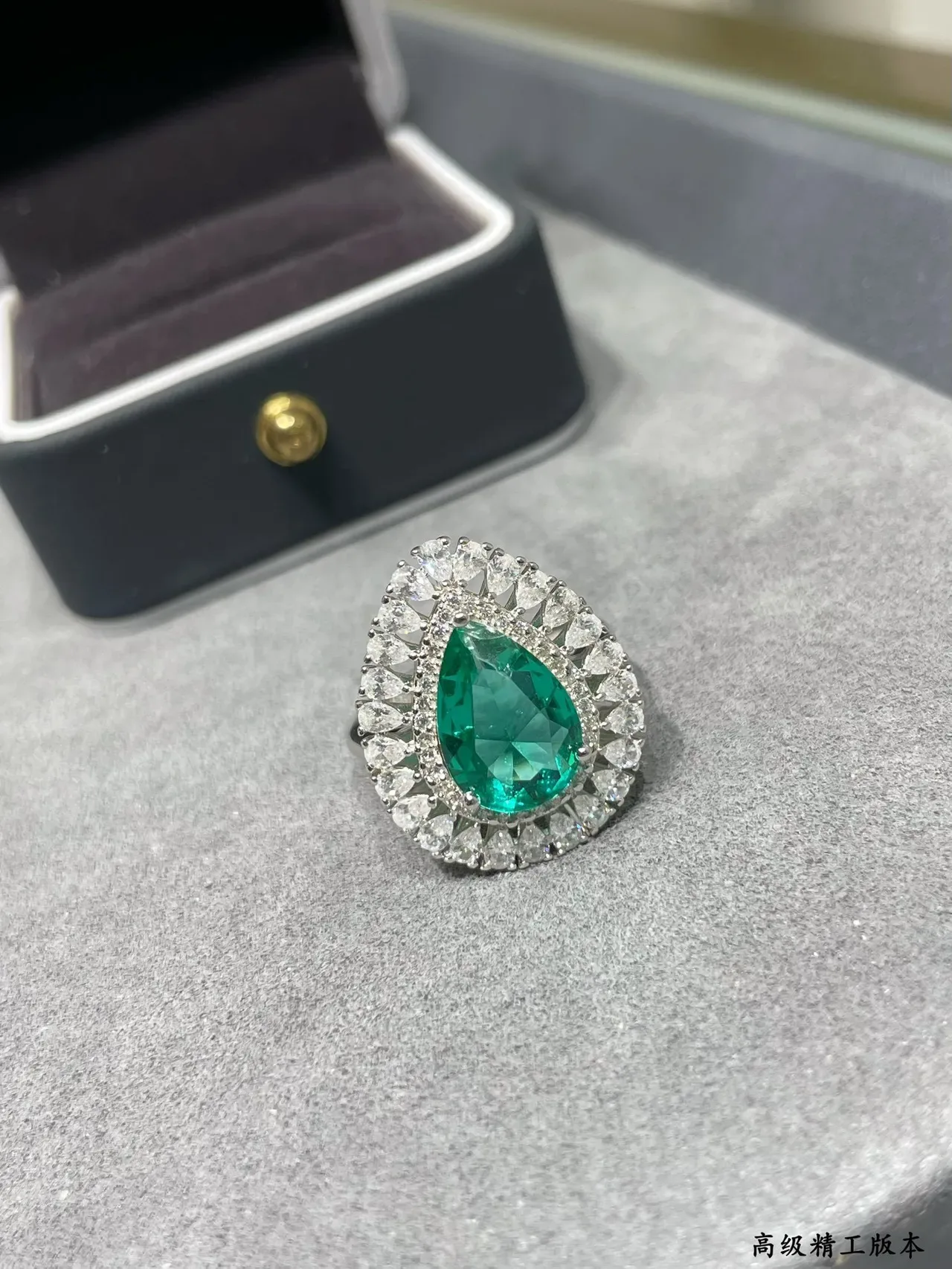 Pear-Cut Emerald and Diamond Halo Ring 6