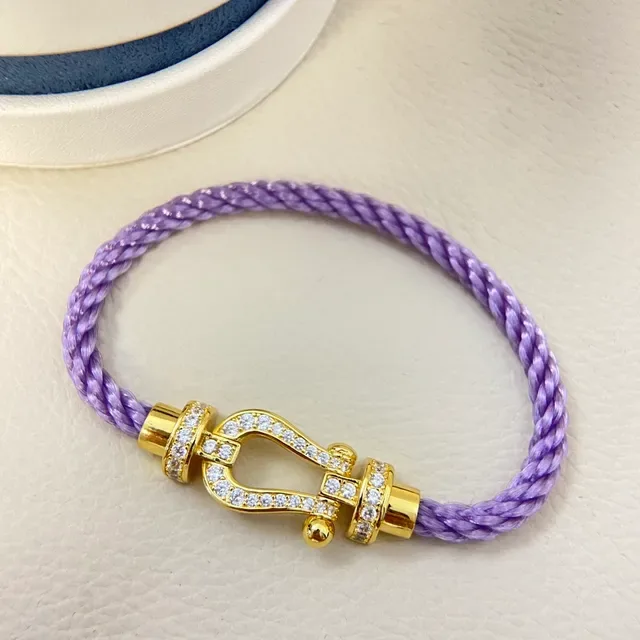 Pulseira de cordão trançado roxo e dourado com fecho em forma de ferradura 4
