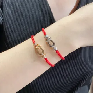 سوار حبل مضفر أحمر ذهبي إغلاق معدني shackle-style