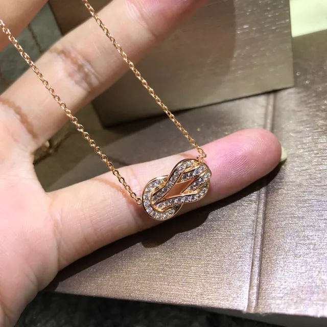 Silver Gold Knot-Shaped Pendant Pavé-Set Stones Necklace 3