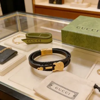 Gucci Guitar Motif Braided Leather Bracelet