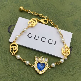 Gucci Heart Pendant Pearl and GG Logo Gold-Tone Bracelet