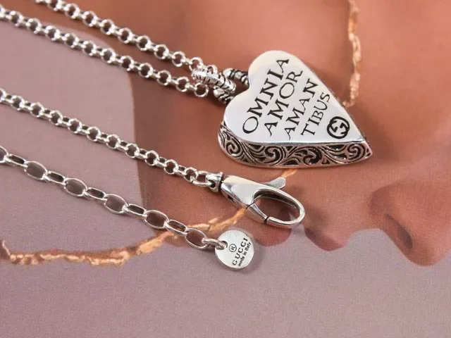 Gucci Silver Black Heart-Shaped Locket Engraved Latin Phrase Necklace 9