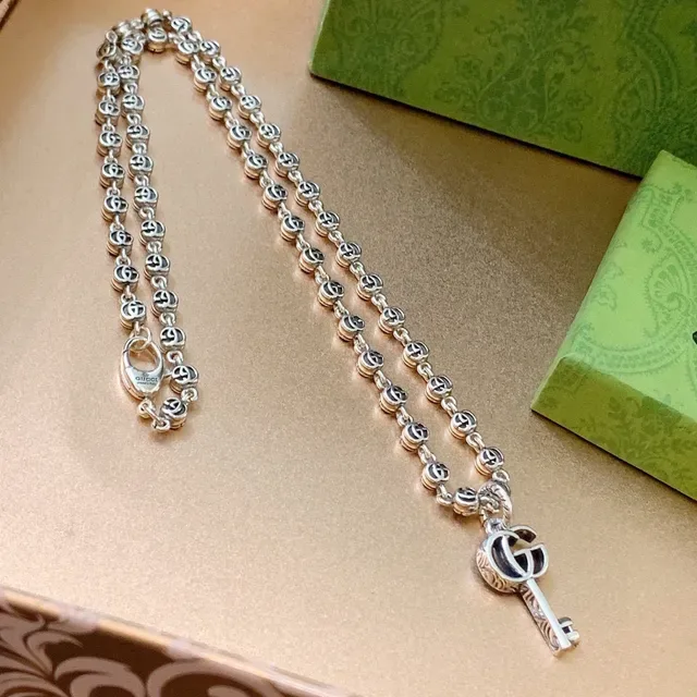 Gucci Silver Interlocking GG-Link Chain Key-Shaped Pendant Necklace 7