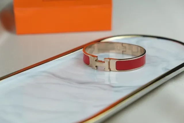 Hermès Clic H Red Enamel Gold-Tone Rigid Bracelet 7
