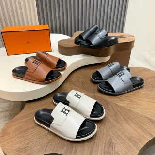 Hermès Slide Correa de cuero marrón negro logo H entrelazado sandalias