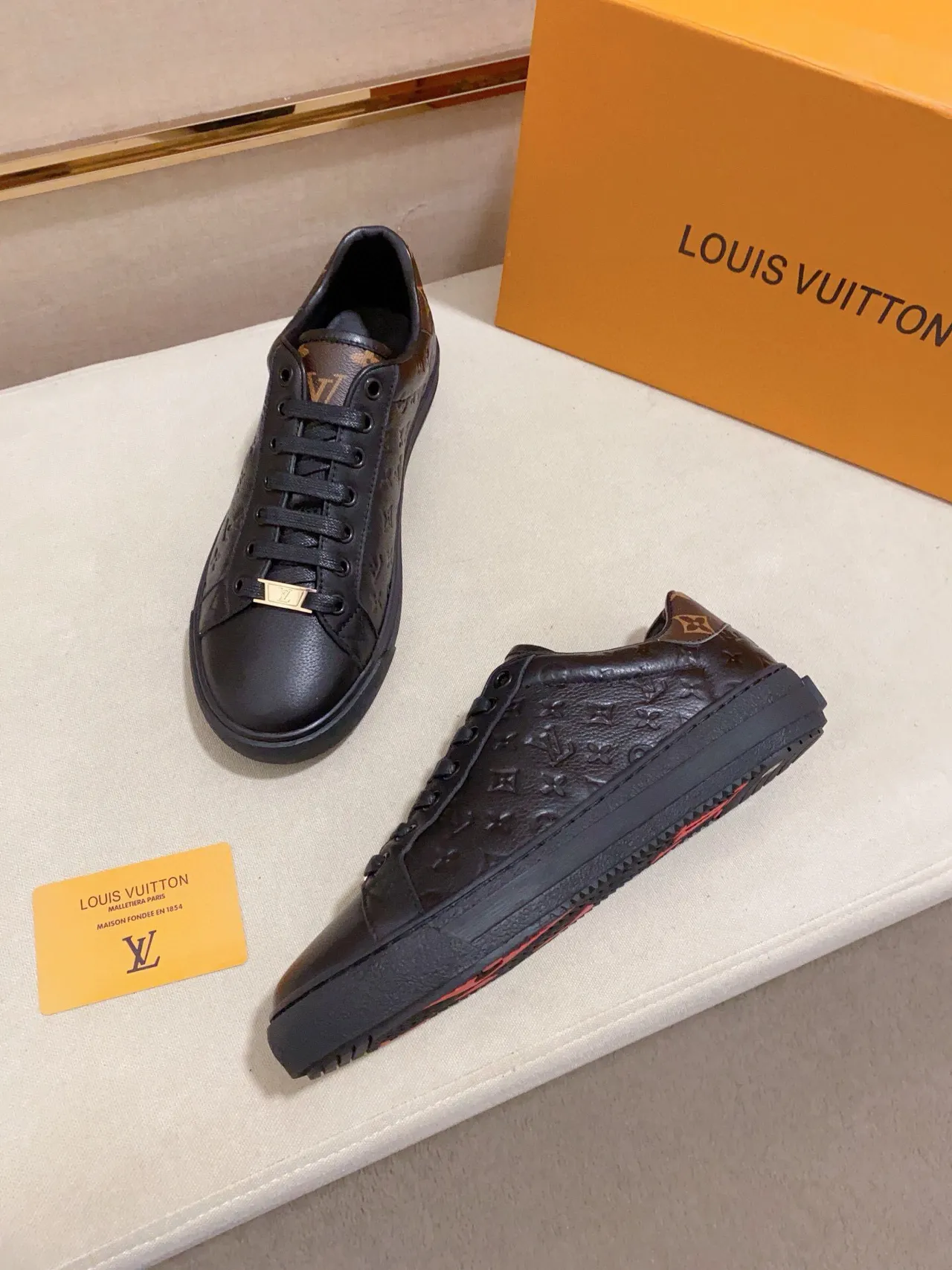 Louis Vuitton Black Gold Embossed Monogram Leather Low-Top Silhouette Lifestyle Sneakers 7