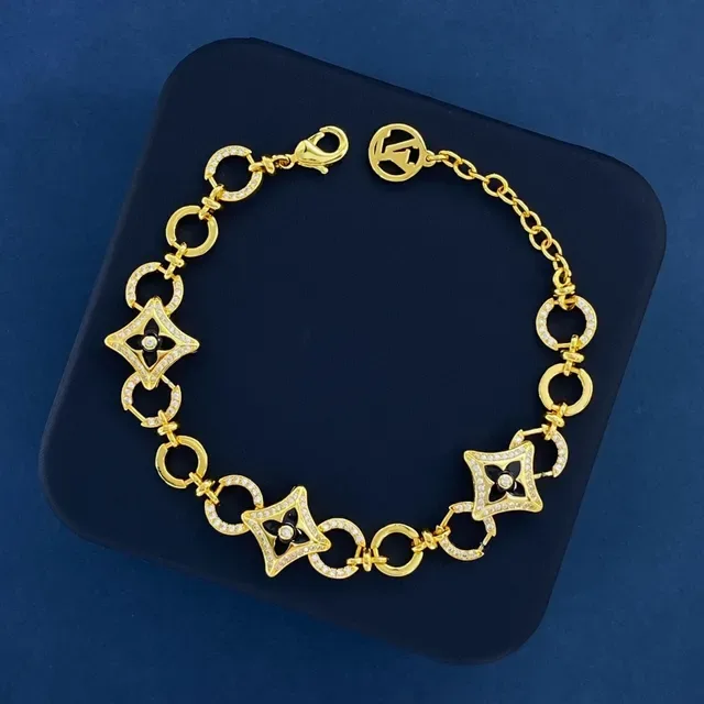 Pulsera Louis Vuitton Blossom Quatrefoil Link Oro y Negro Esmalte Cristal 2