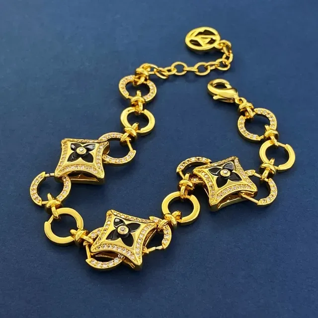 Pulsera Louis Vuitton Blossom Quatrefoil Link Oro y Negro Esmalte Cristal 4