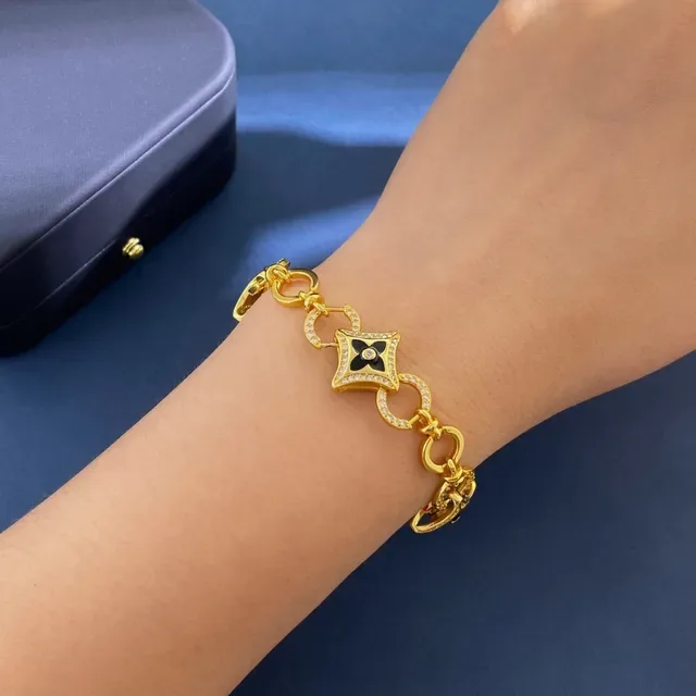 Pulsera Louis Vuitton Blossom Quatrefoil Link Oro y Negro Esmalte Cristal 5