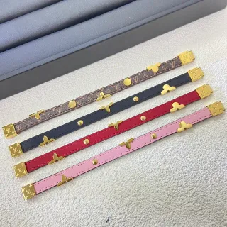 Louis Vuitton Pulsera de cuero marrón dorado estrecha con broches florales