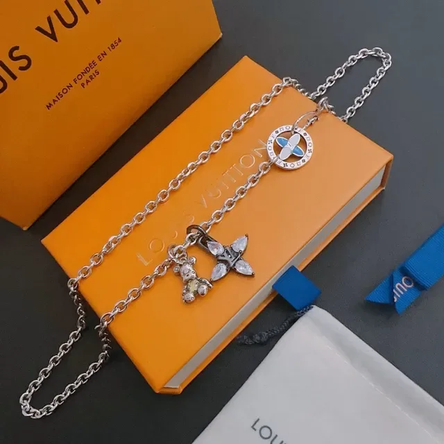 Louis Vuitton Enamel Medallion and Crystal Bear Charm Necklace 9