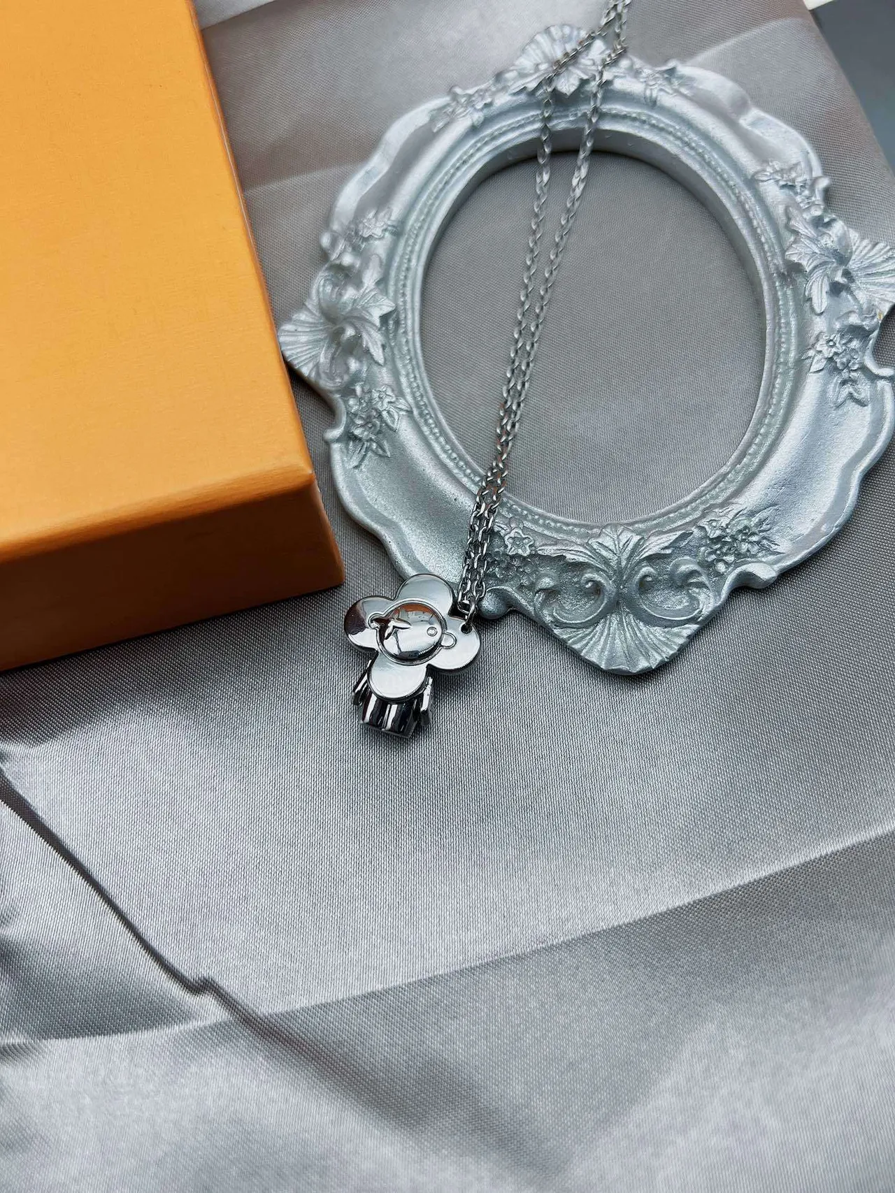 Louis Vuitton Flower Lock Silver-Tone Floral Pendant Necklace 7