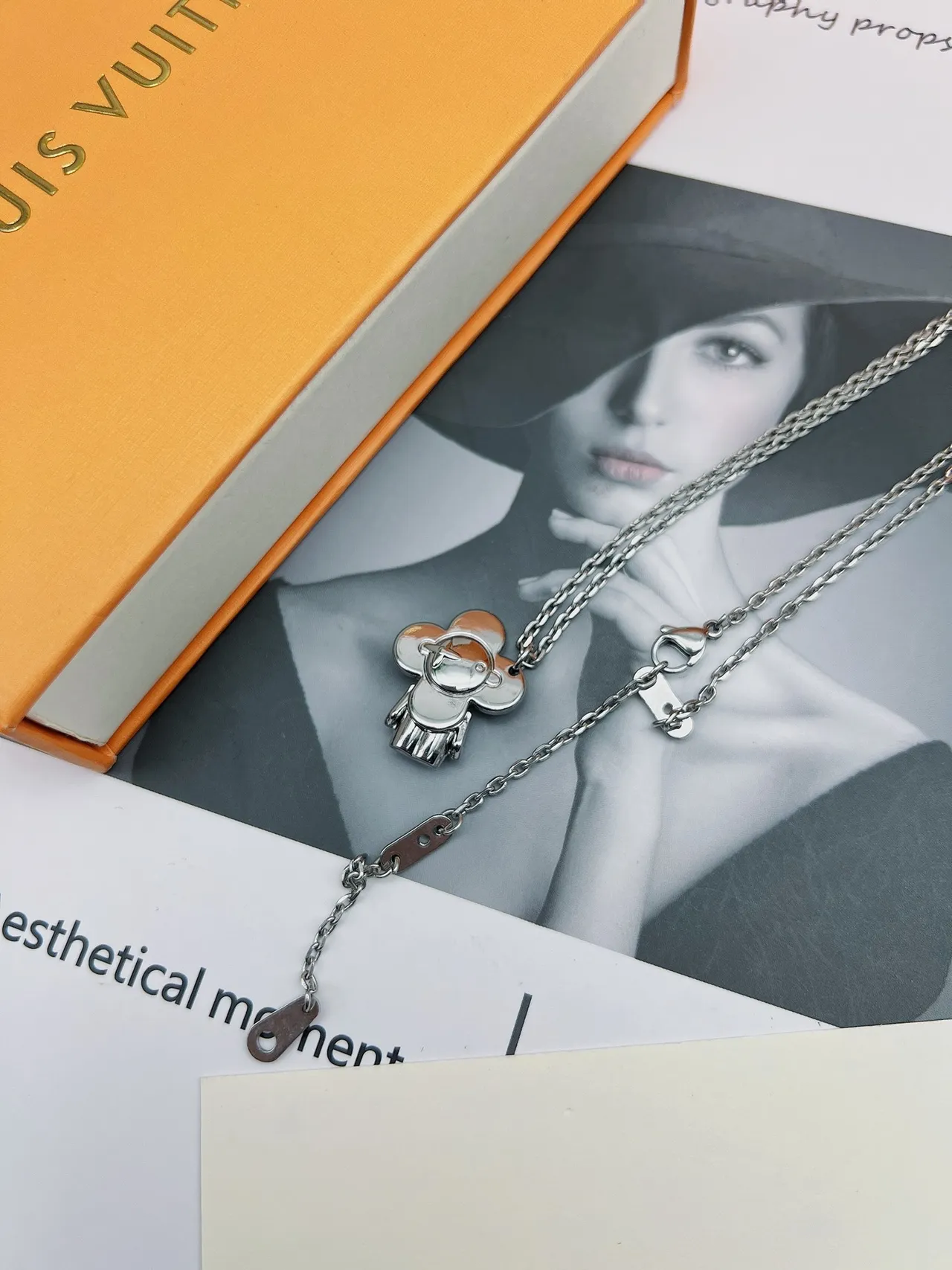 Louis Vuitton Flower Lock Silver-Tone Floral Pendant Necklace 9