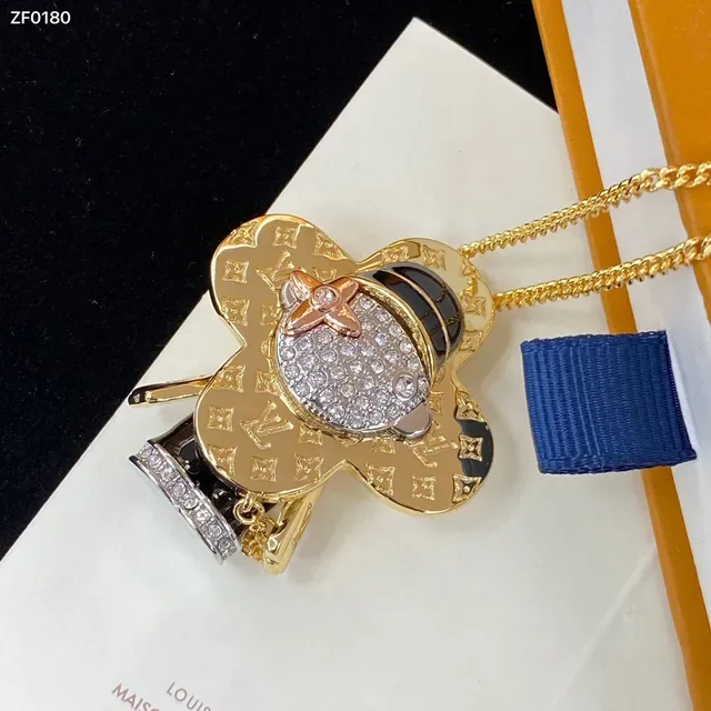 Louis Vuitton Flower Pendant Gold-Tone Crystal Necklace 3