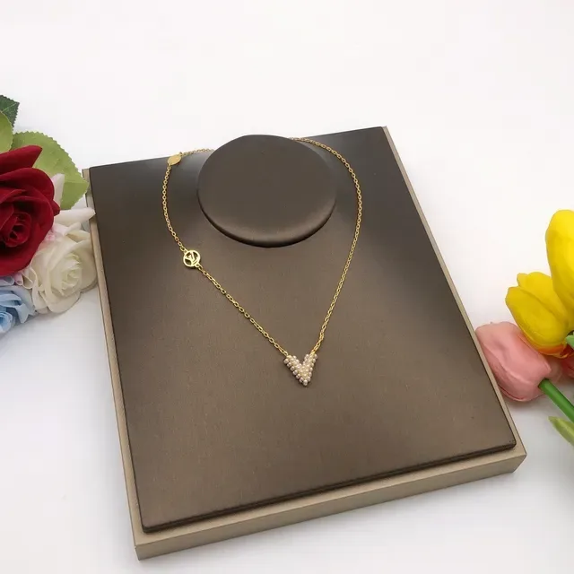 Louis Vuitton Gold Chain Pearl V-Shaped Pendant Necklace 2