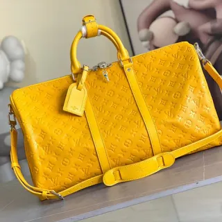 Louis Vuitton Keepall Embossed Monogram Yellow Duffle Bag