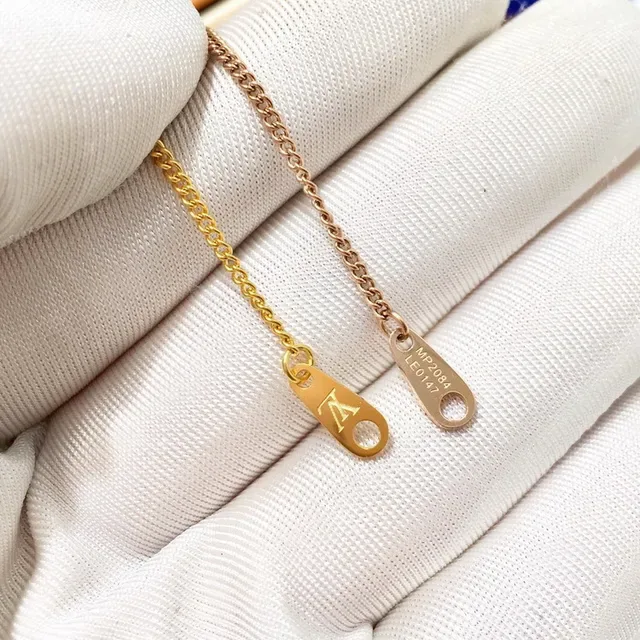 Louis Vuitton LV Monogram Silver-Tone Pendant Necklace 8