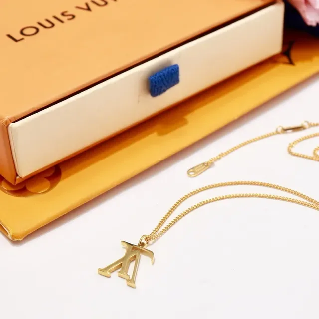 Louis Vuitton LV Monogram Silver-Tone Pendant Necklace 9