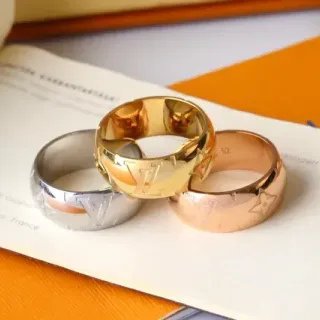 Louis Vuitton LV Star Gold Silver Wide Band Engraved Monogram Ring