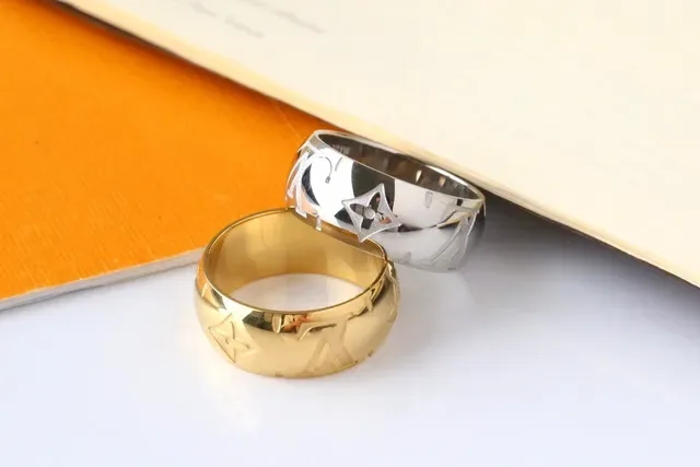 Louis Vuitton LV Star Gold Silver Wide Band Engraved Monogram Ring 7