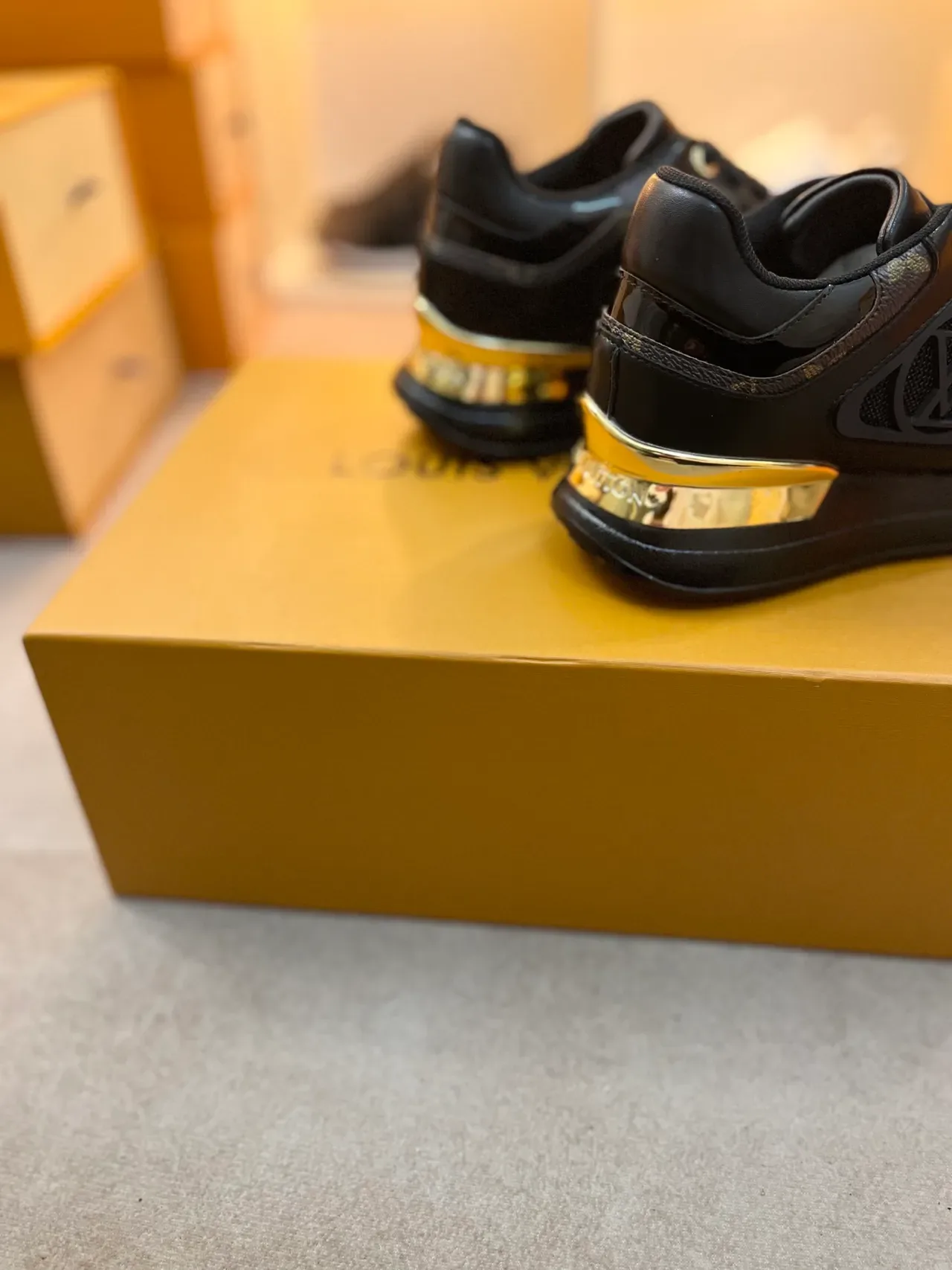 Louis Vuitton LV Trainer Black Gold Monogrammed Side Panel Heel Lifestyle Sneakers 2