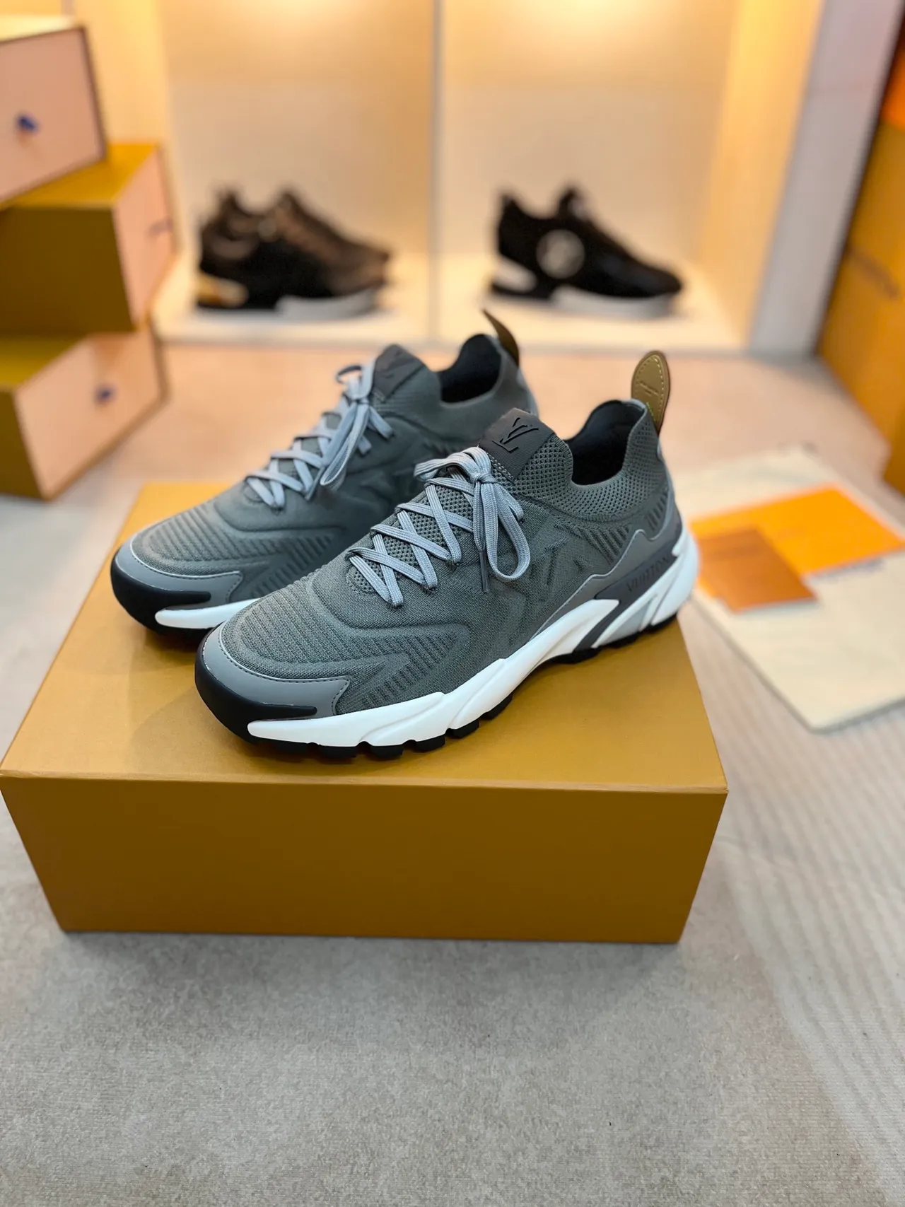 Louis Vuitton LV Trainer Gray White Knit Upper Sculpted Midsole Chunky Sneakers 4