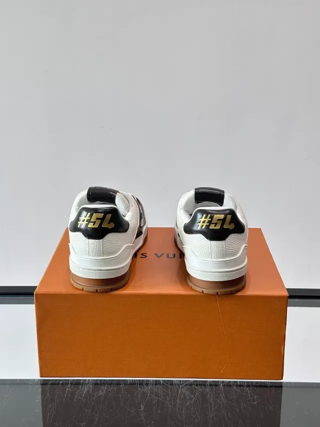 Louis Vuitton LV Trainer White Black Layered Leather Construction Monogrammed Side Panel Lifestyle Sneakers 3