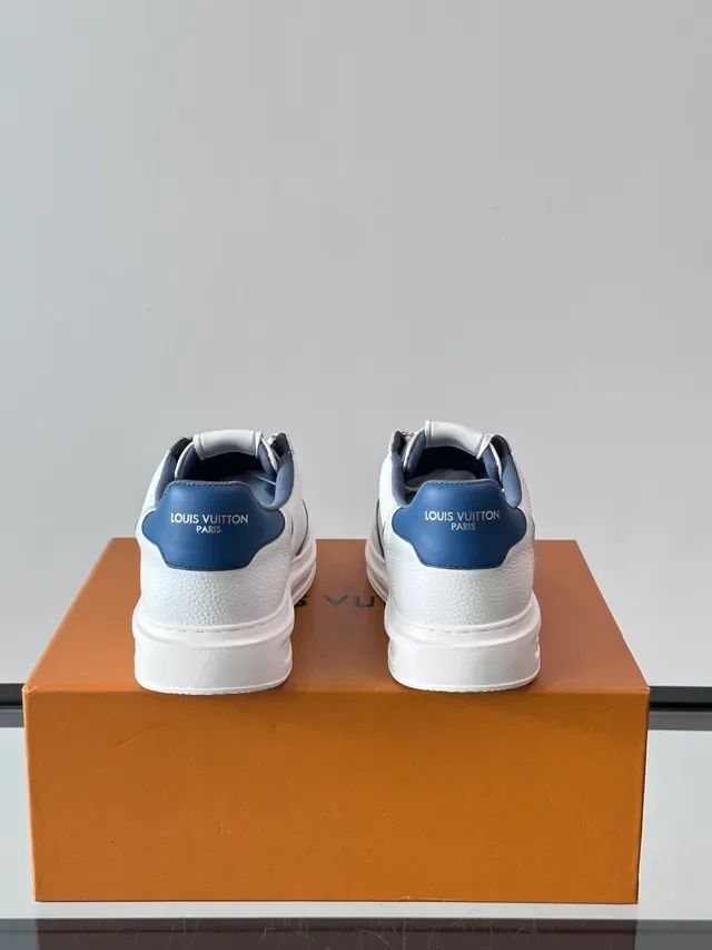 Louis Vuitton LV Trainer White Navy Low-Top Textured Leather-Mesh Upper Lifestyle Sneakers 4