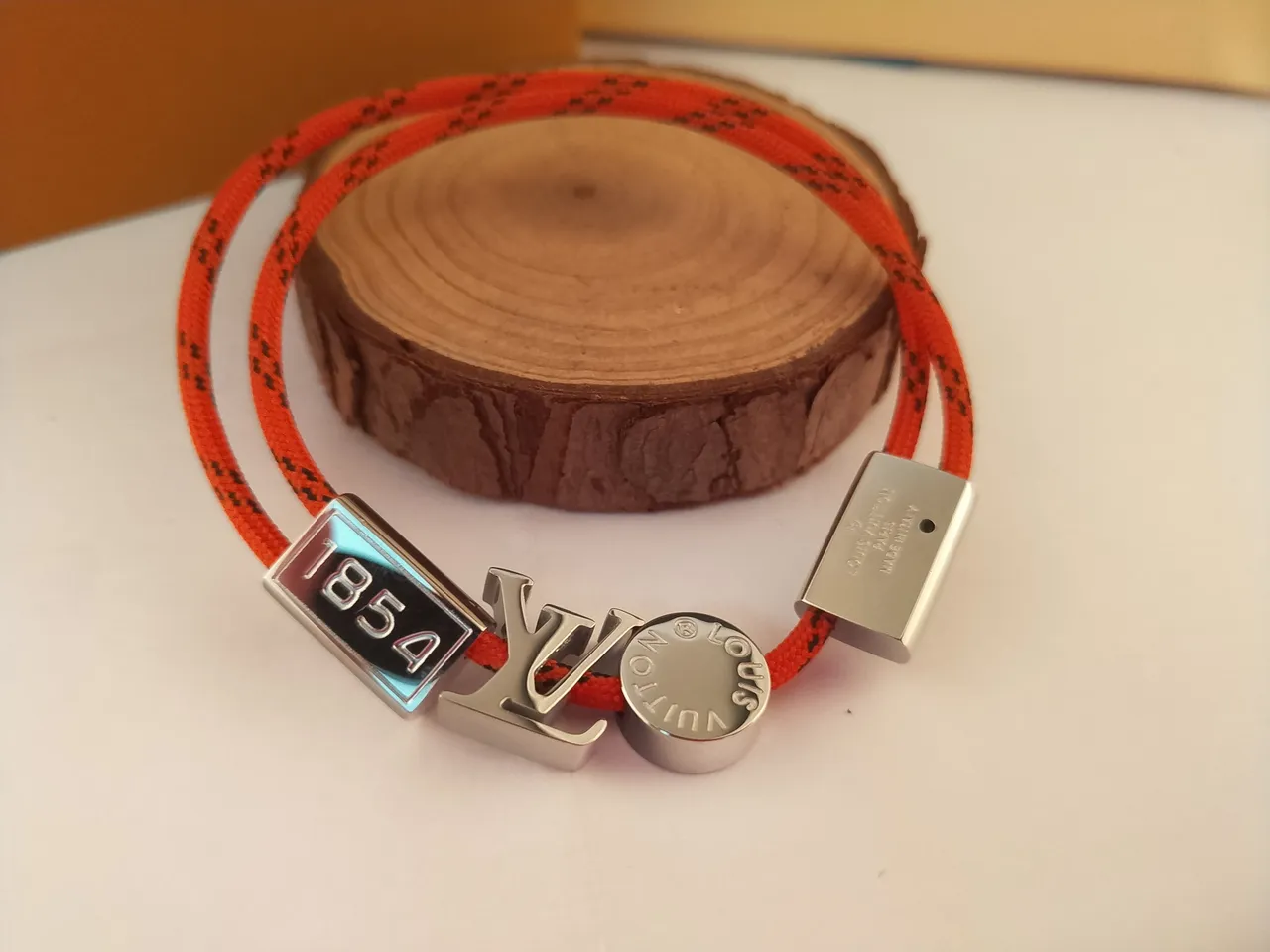 Louis Vuitton Multi-Charm Orange Braided Cord Bracelet 1