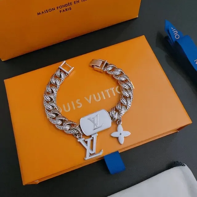 Louis Vuitton Perforated Curb-Link Monogram Charm Bracelet 9