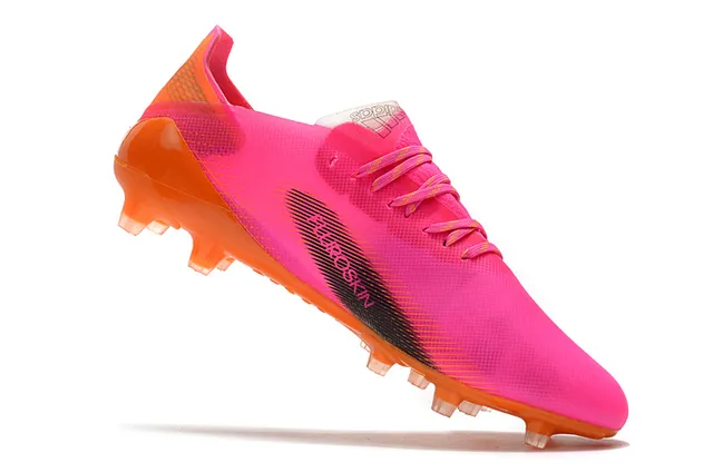 Nike Multicolore Rouge Chaussures de football à coupe basse avec upper synthétique pour terrain ferme 24