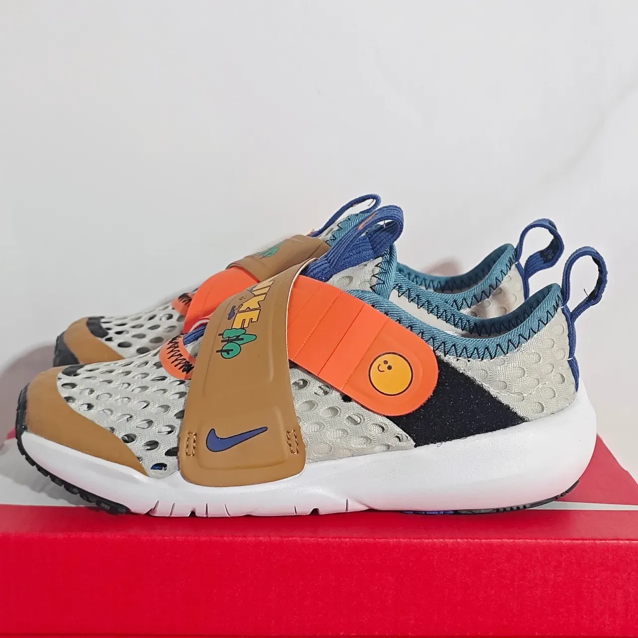 Nike Run All Day White Multicolor Laceless Hook-and-Loop Strap Perforated Mesh Upper Lifestyle Sneakers 2
