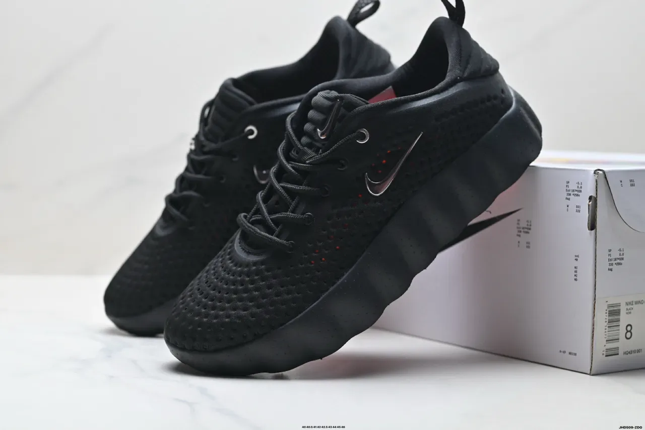 Nike White Black Perforated Knit Upper Sculpted Segmented Midsole Sneakers 9