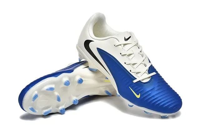 Nike Sapatos de futebol branco e azul low-cut com upper sintético com overlay ribeteado na ponta dianteira para superfície firme 7