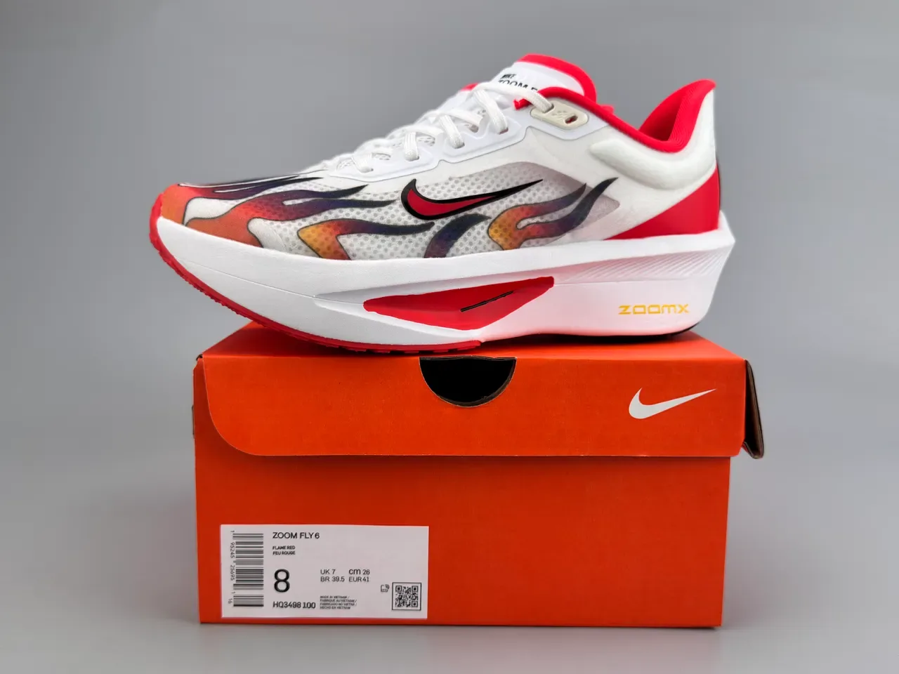 Nike Zoom Fly Chaussures de running blanches rouges avec impression de flamme, upper en maille, midsole complète ZoomX 2
