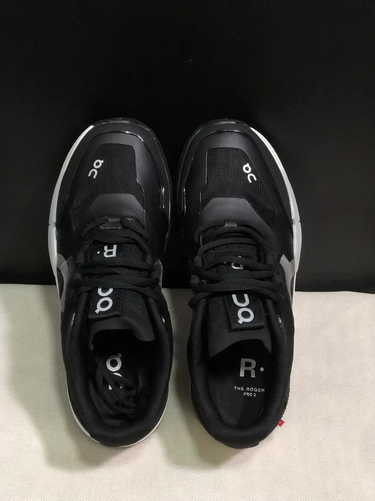 On THE ROGER Pro2 Black White Lifestyle Sneakers 4