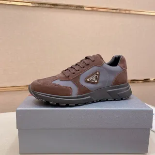 Prada Cloudbust أحذية رياضية بنية و رمادية