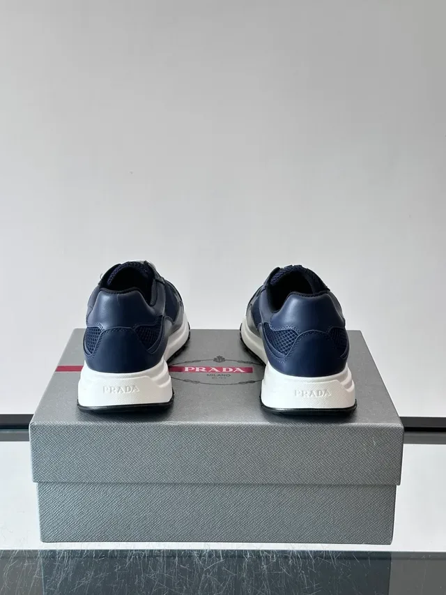 Prada Navy White Mesh And Leather Panel Construction Triangular Metal Logo Plaque Lifestyle Sneakers 3