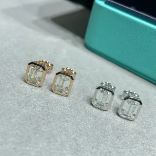 Tiffany & Co. Boucles d'oreilles à coupe émeraude serti à biseau