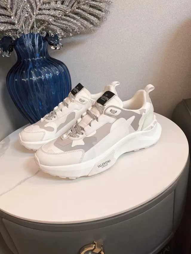 Valentino Rockstud semelles blanches grises panneaux camouflage sneakers chunky 6